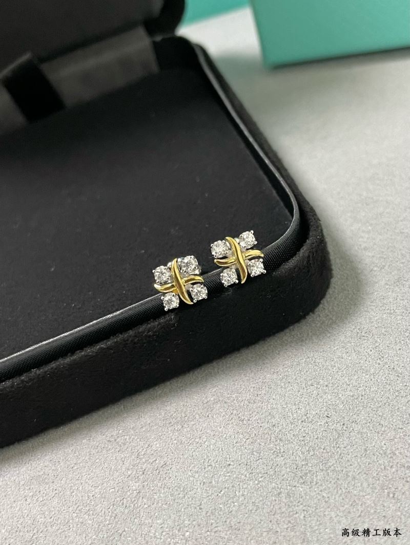 T*f*ny earrings